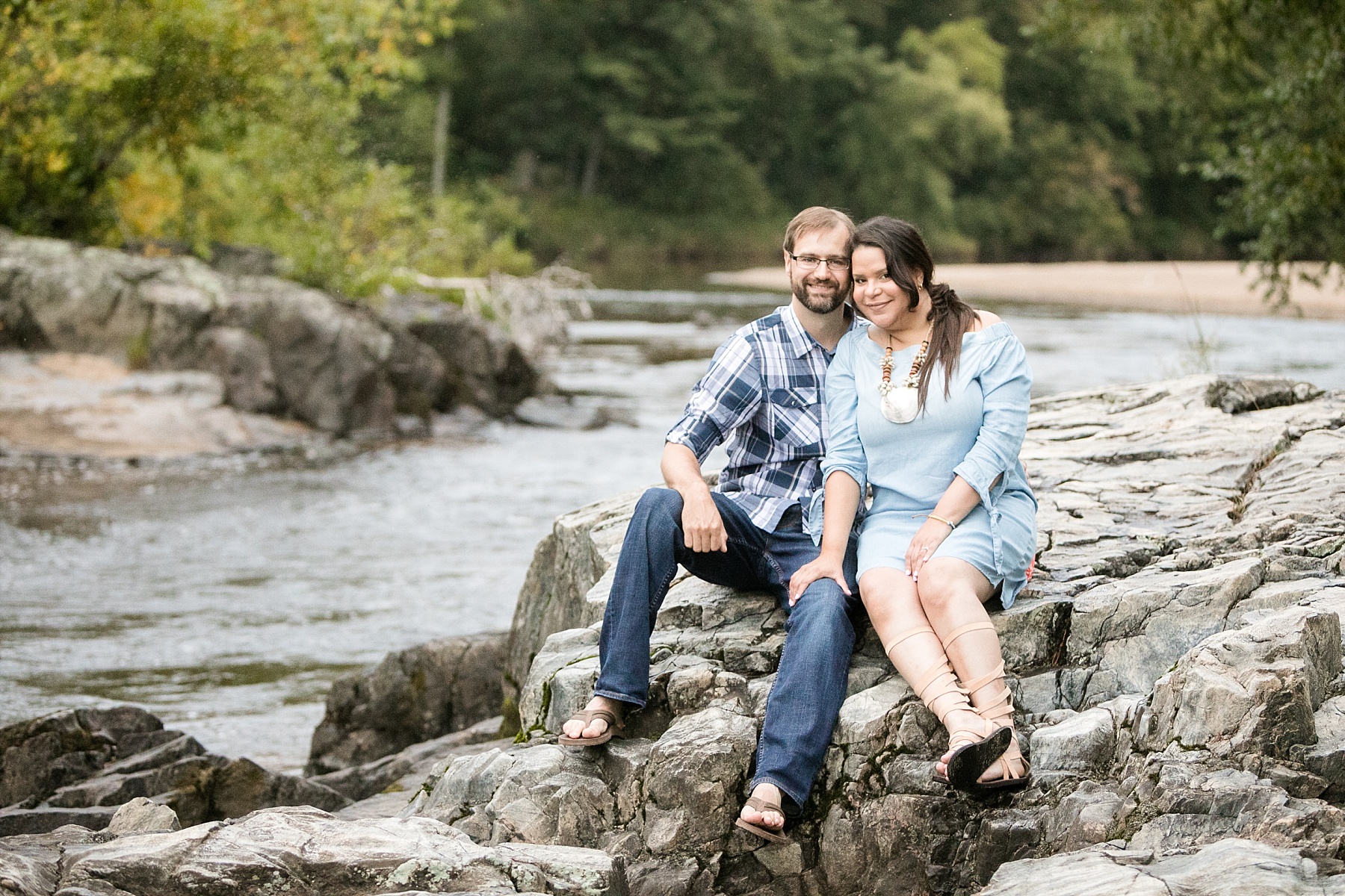 A Big Falls elopement session just outside of Eau Claire was perfect for these two hailing from different parts of the world.