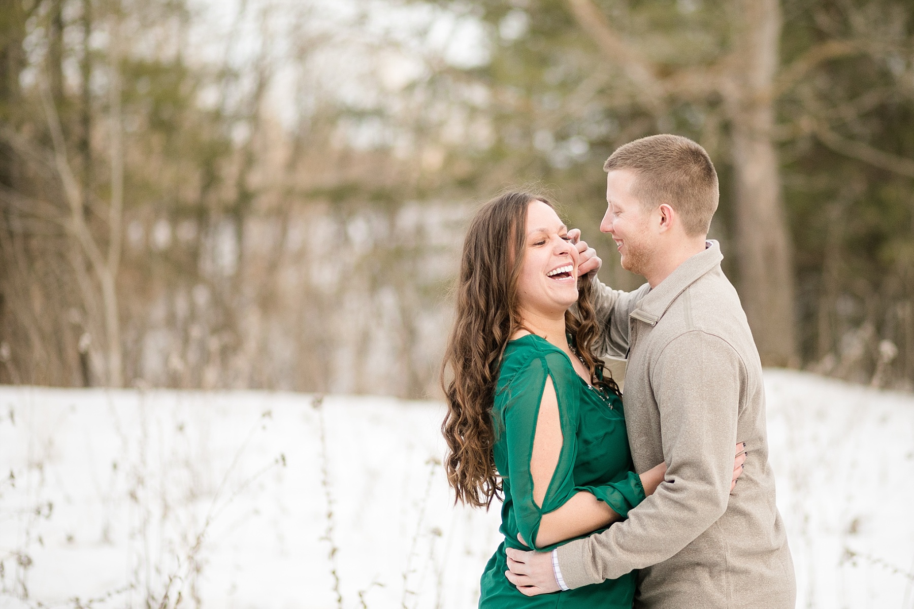 Ice hanging from the rock formations at Devils Punchbowl in Menomonie made for a great setting for Marie & Austin's engagement photos.