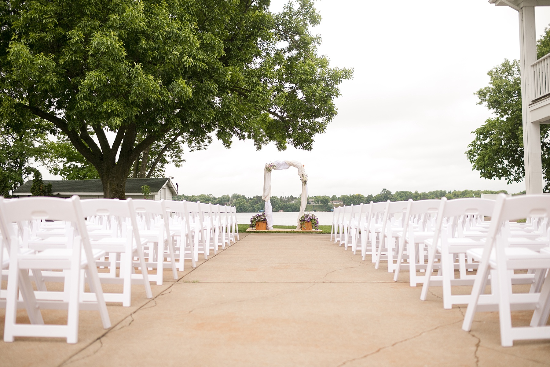 Delicate details and tender moments surrounded Bailey & Jenna for their Lake Wissota Golf wedding.