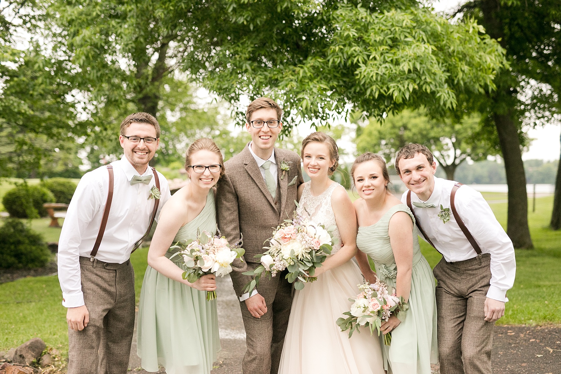 Delicate details and tender moments surrounded Bailey & Jenna for their Lake Wissota Golf wedding.