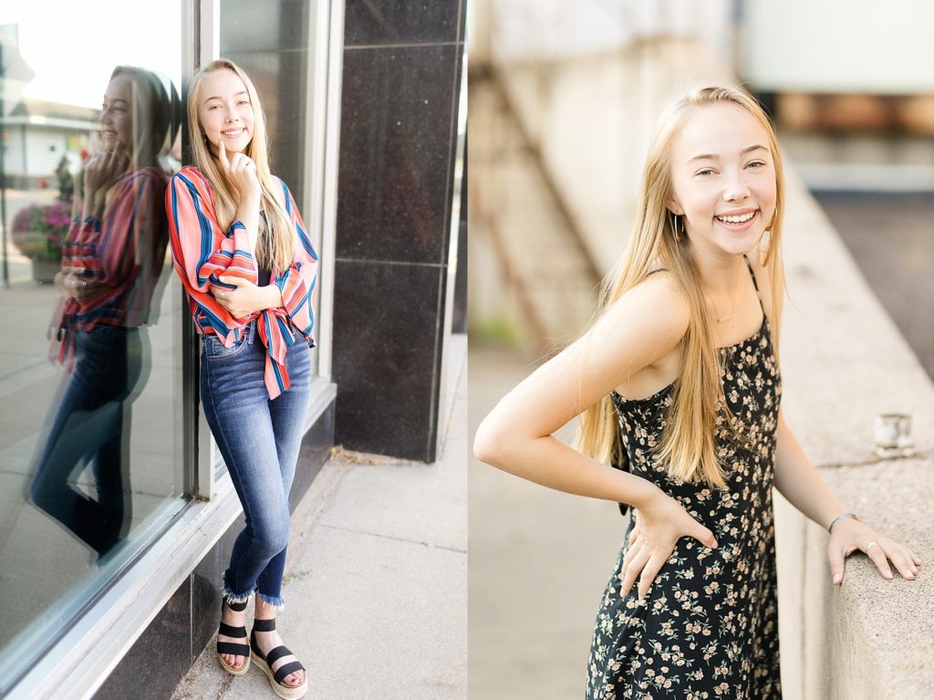 girl in a bright striped top and floral dress laughing for her Eau Claire boho senior photos