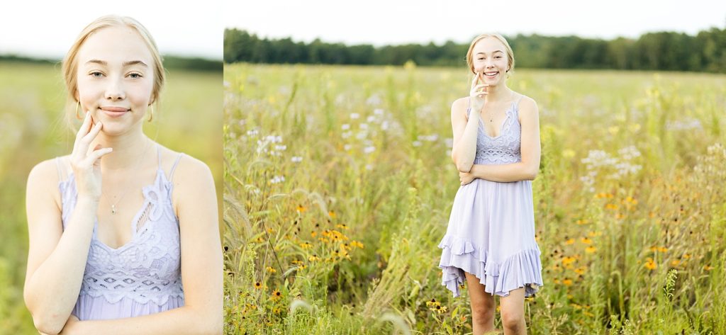 girl in a purple dress in a field for her Eau Claire boho senior photos