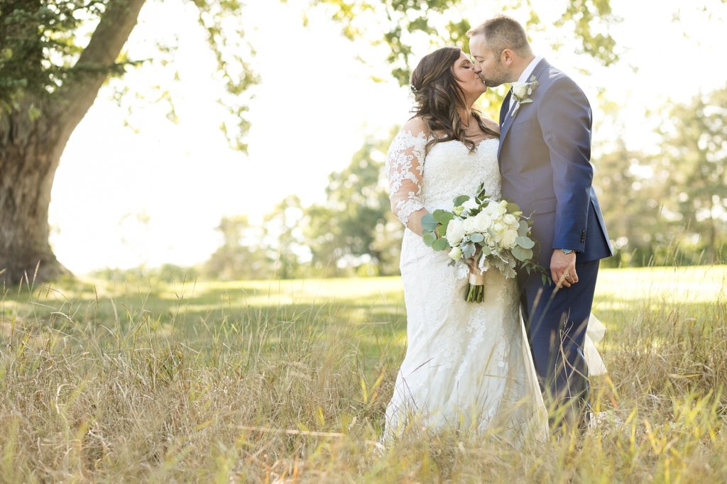 couple in the field at Lake Wissota Golf & Events