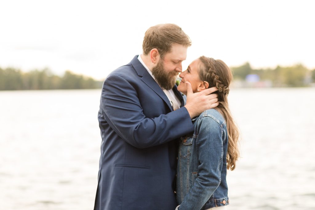 bride and groom on the lake in Minocqua for their wedding day