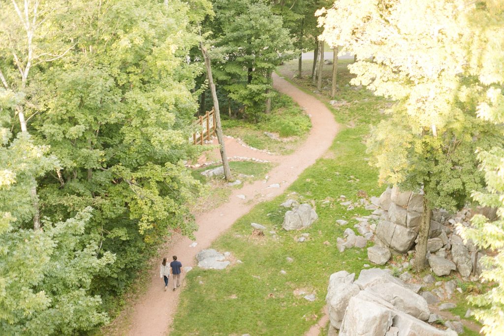 view from the tower down to the ground at Rib Mountain State Park in Wausau for their engagement pictures
