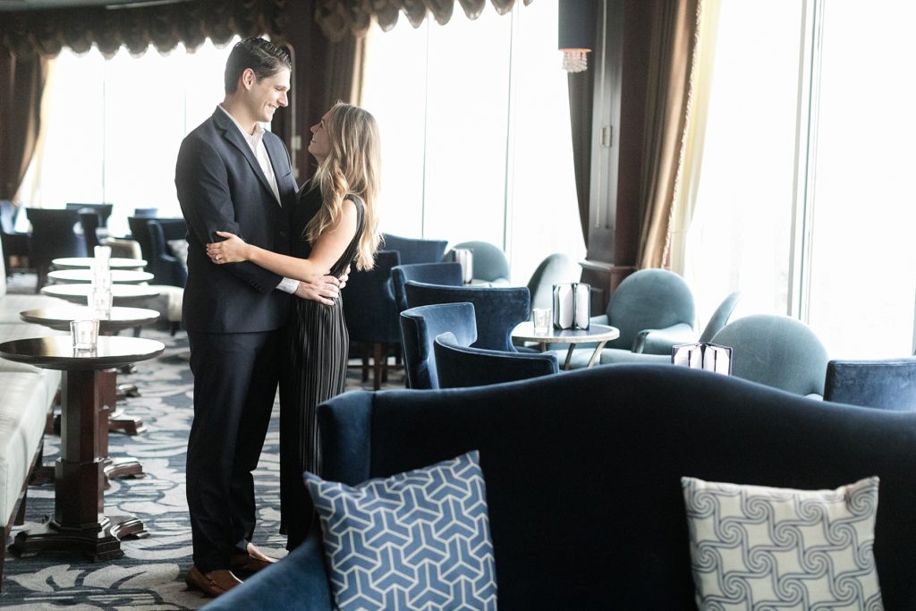 couple just engaged in Blu at the top of the Pfister Hotel in Milwaukee