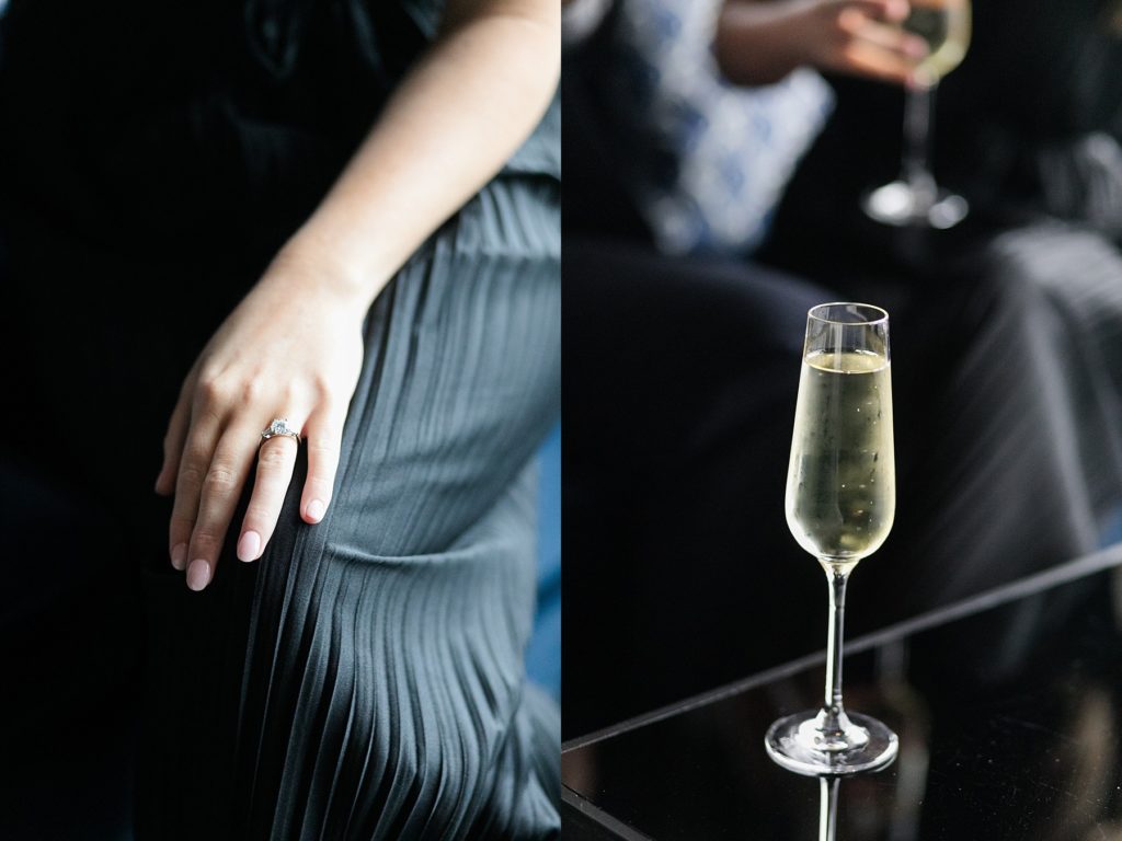 girl with ring and glass of champagne after saying yes in a proposal at the Milwaukee Art Museum in Blu at the top of the Pfister Hotel in Milwaukee