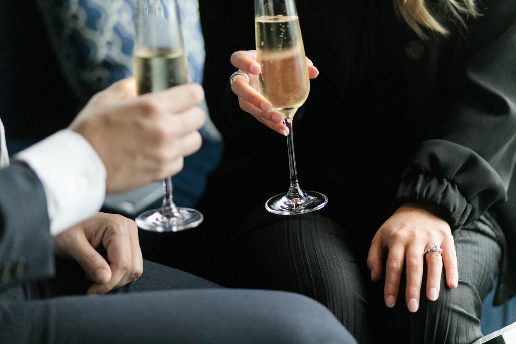couple share a glass of champagne in Blu at the top of the Pfister Hotel in Milwaukee