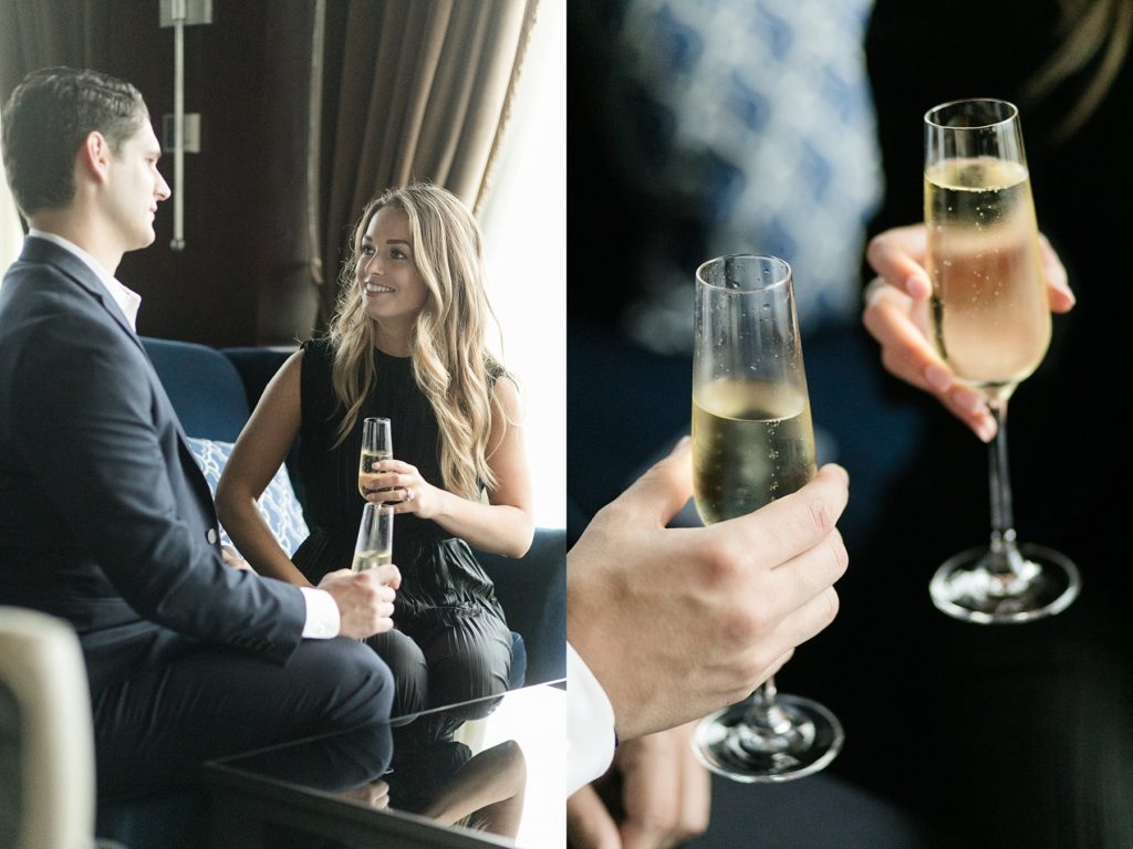 couple sharing a glass of champagne to celebrate their proposal in Blu at the top of the Pfister Hotel in Milwaukee