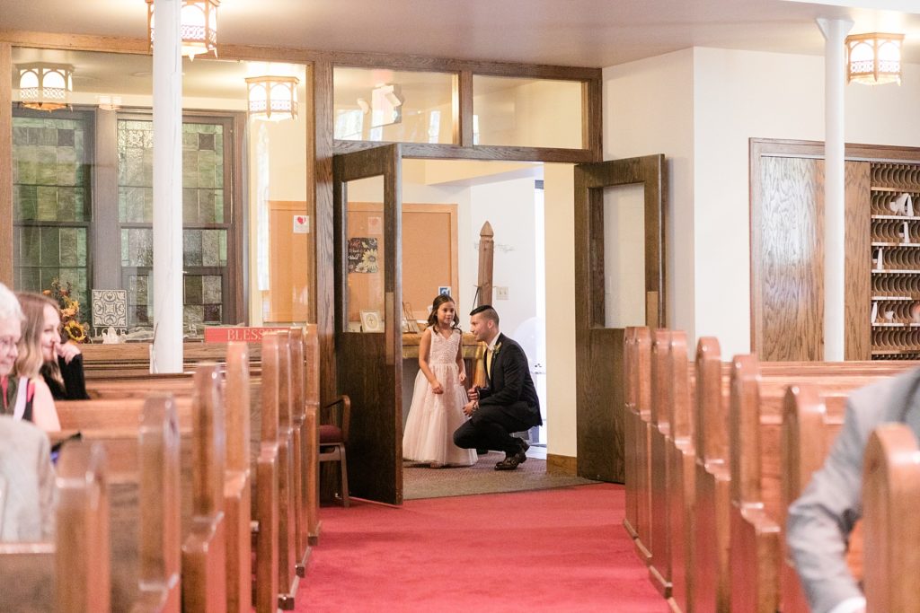 daughter and father before she walks him down the aisle at Zion United Methodist Church wedding in Chippewa Falls