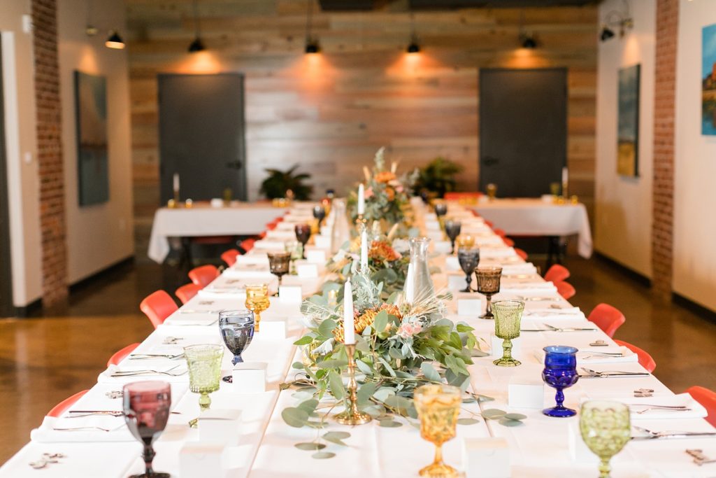 table in the gallery set for a wedding at the Oxbow Hotel in Eau Claire
