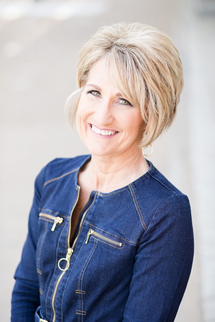 Eau Claire Realtor Angela Welch poses for headshots downtown