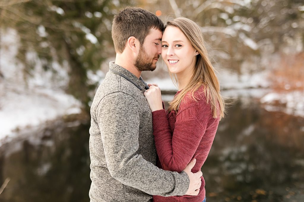 couple outside in the winter for their engagement session in Wisconsin