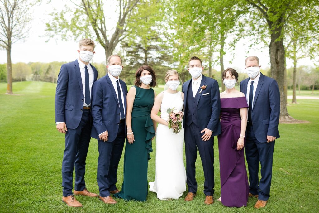 family photos with face masks at wedding in Rice Lake, WI at Turtleback Golf