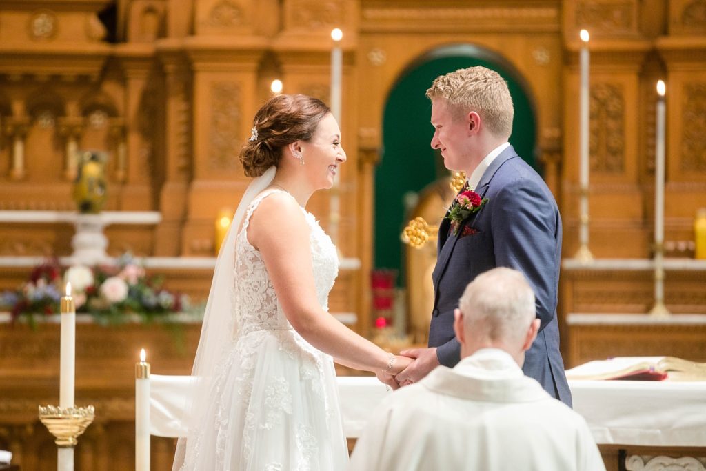 wedding ceremony at stunning wedding in Marathon, WI at St. Mary's Catholic Church