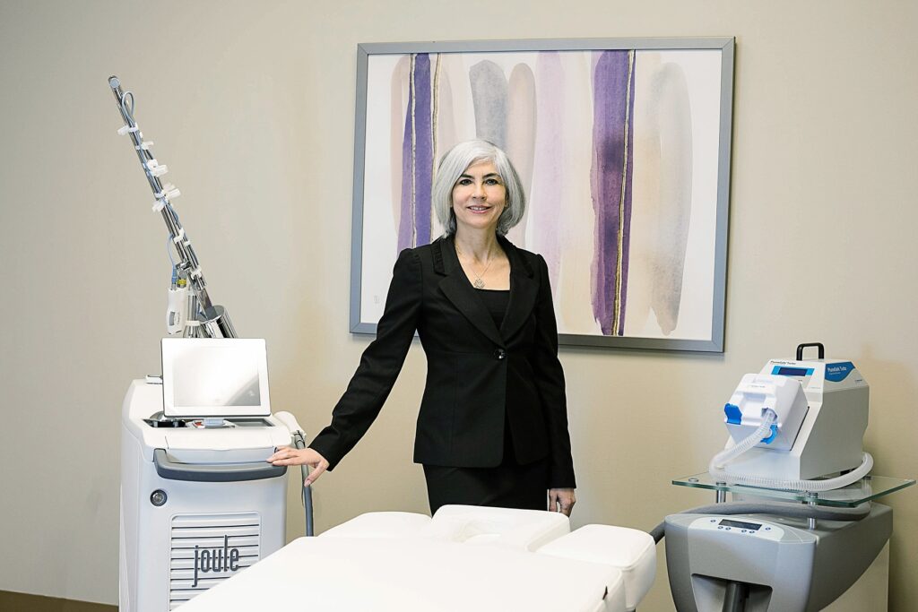 Dr. Michelle Facer in the laser treatment room at Lotus Spa