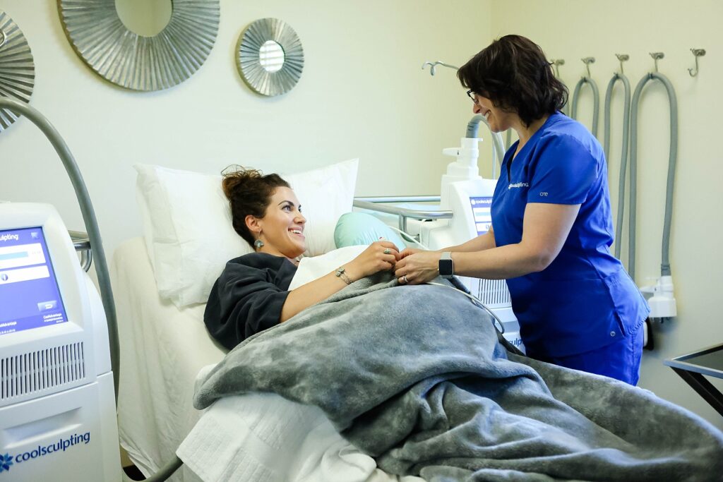 A patient during the CoolSculpting process with Jennifer Boettcher - RN